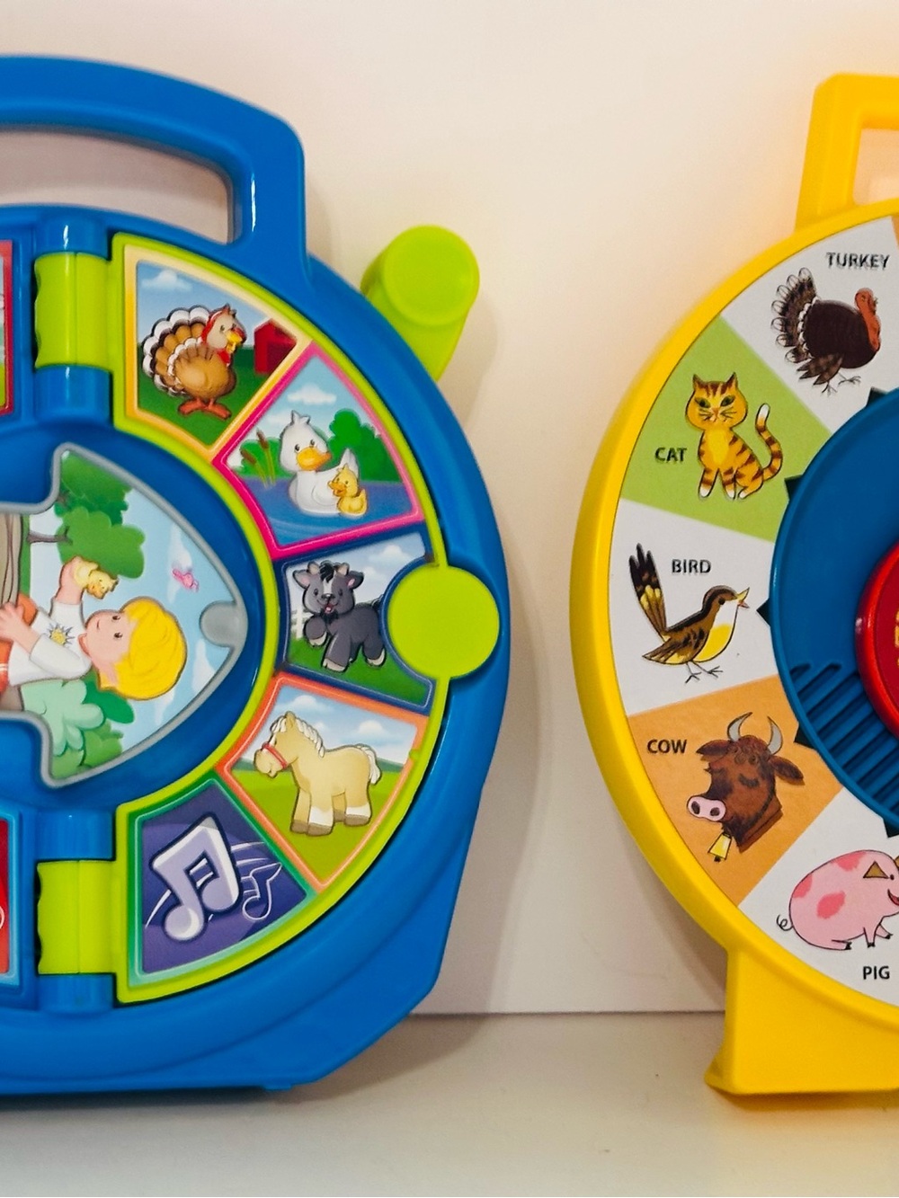 Fisher-Price Blue and Yellow Animal Sound Spinner Learning Toy
